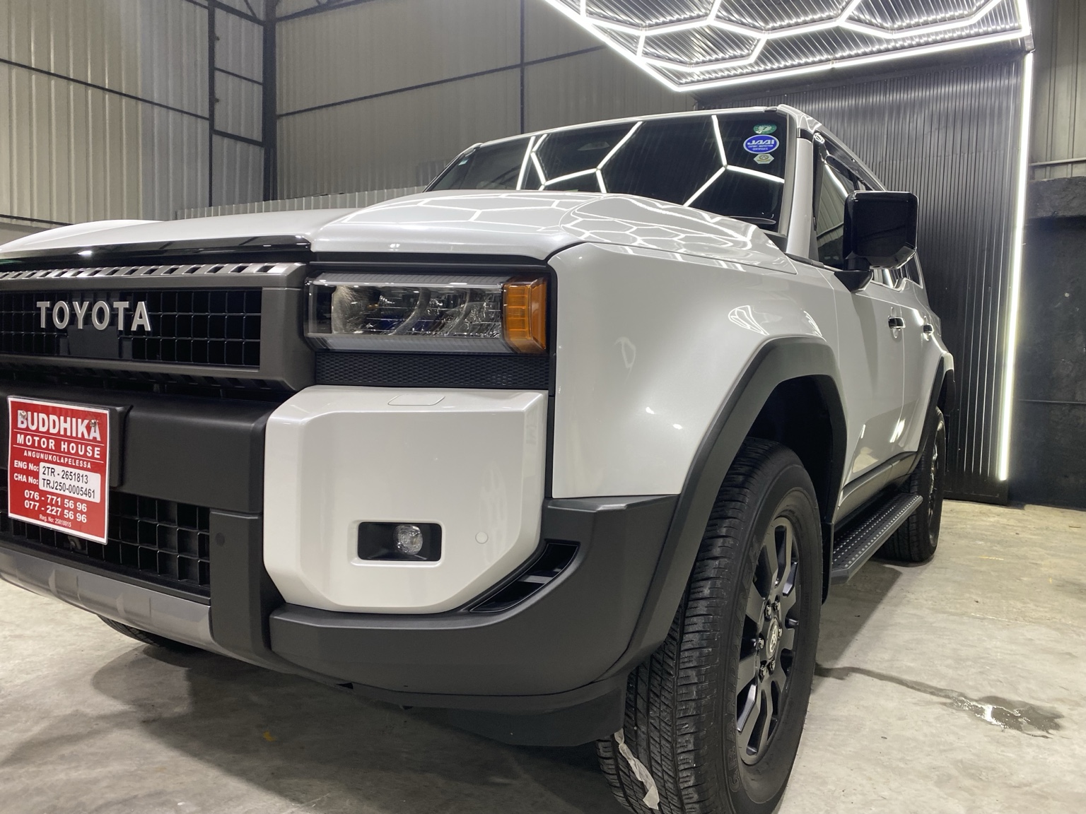 White Toyota Land Cruiser after detailing and coating